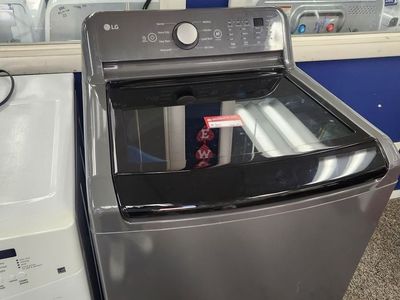 BEAUTIFUL LG HE TOPLOAD WASHER! WITH A FULL WARRANTY