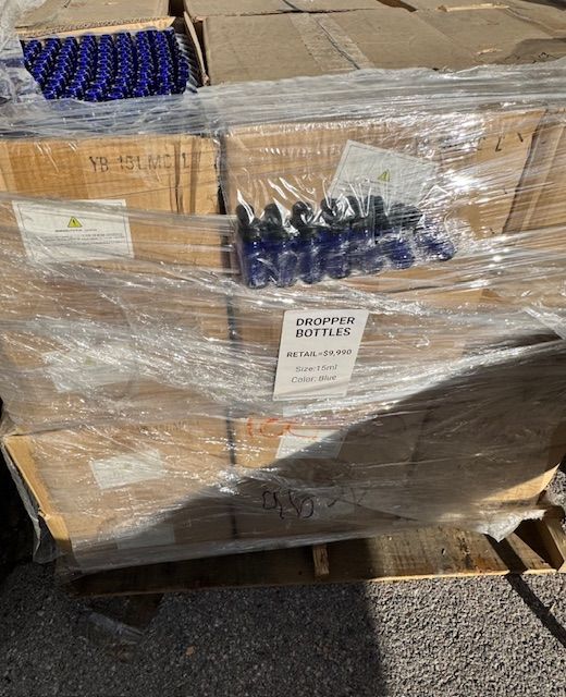 Pallet of Blue Glass Dropper Bottles
