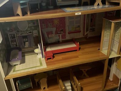 Large Wooden Dollhouse with Multiple Rooms, Stairs, and Furniture