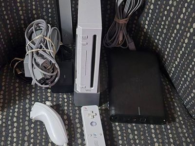 Backwards compatible Nintendo Wii with motionplus controller Homebrew and 750gb hard drive! Trades considered!
