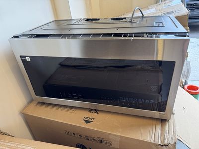 New Scratch and dent Samsung 2.1 cu. ft. Over-the-Range Microwave with Wi-Fi and SmartThings