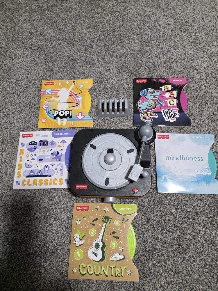Fisher-Price DJ Bouncin' Beats Interactive Musical Learning Toy with 5 Records