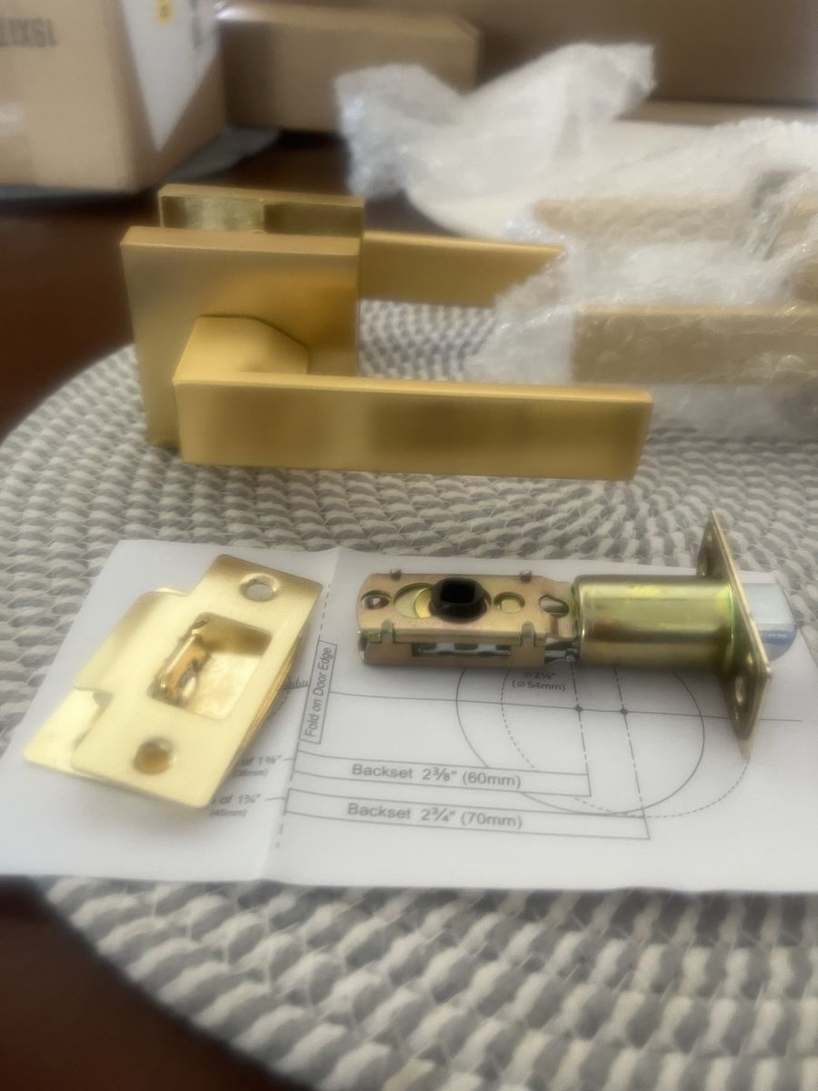 Two Brushed Gold Interior Door Levers