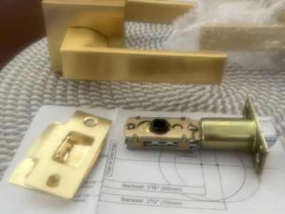 Two Brushed Gold Interior Door Levers