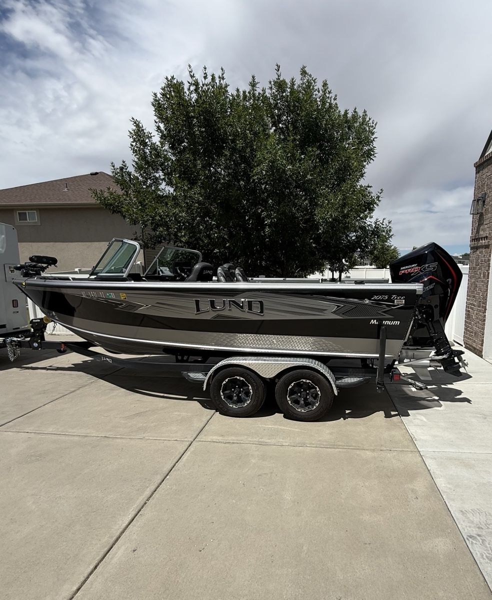 2019 Lund 2075 Tyee Magnum Fishing Boat with 15HP Kicker - 51 Hours