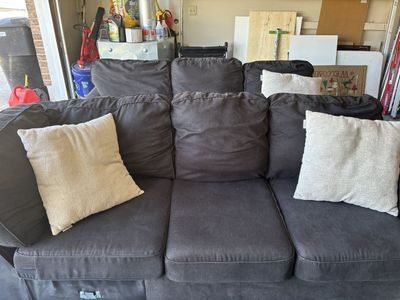 Dark Gray Sectional with pillows