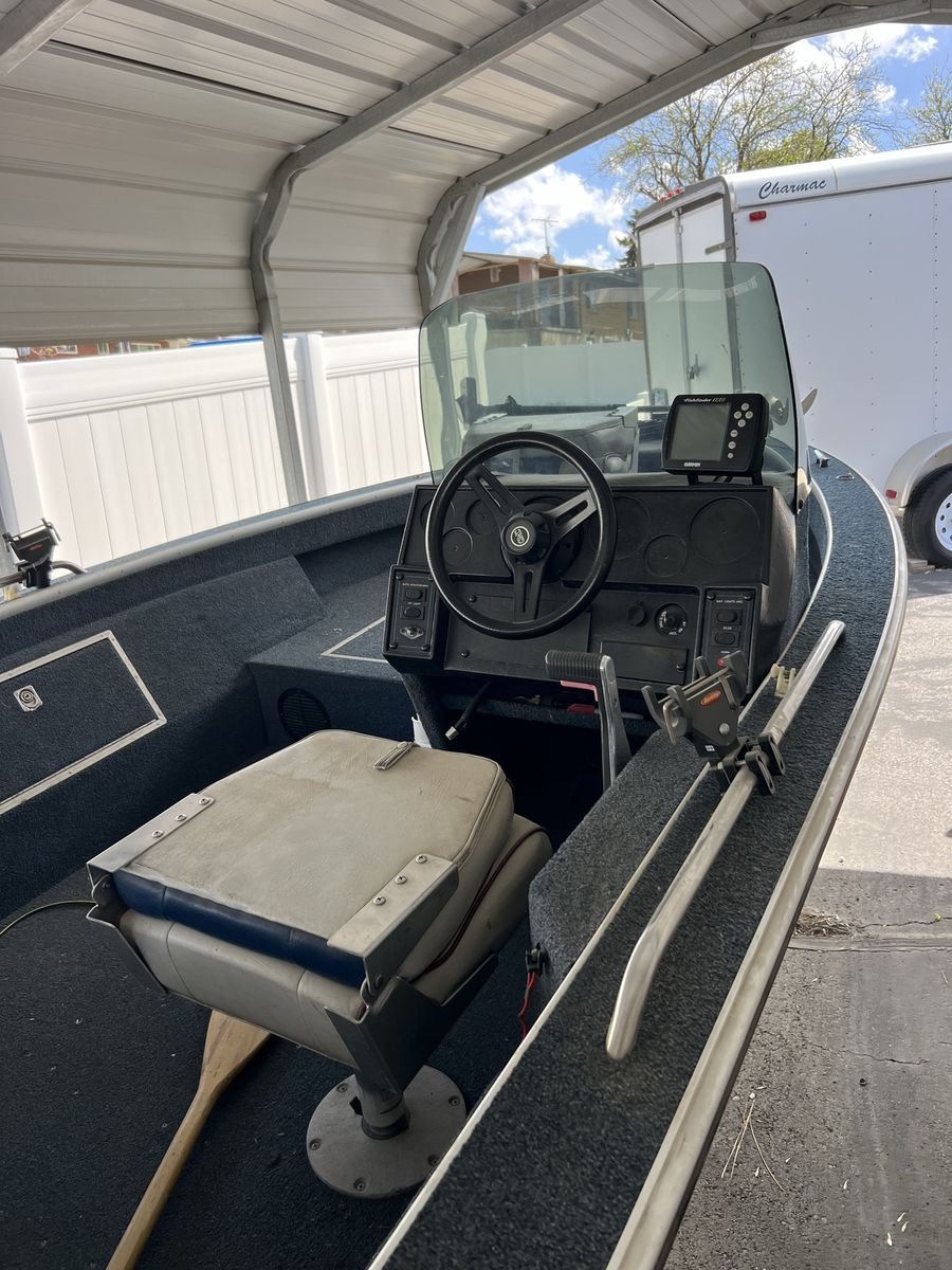 16’ aluminum fishing boat.