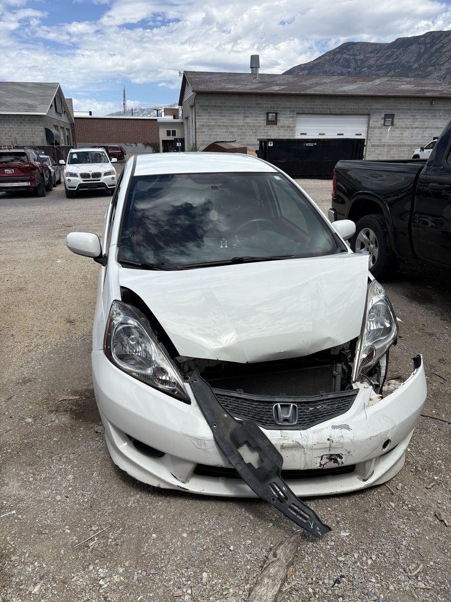 2010 White Honda Fit Sport - Running Car with Front-End Damage