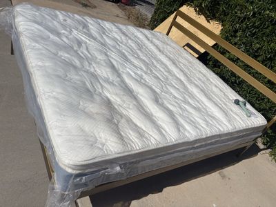 Brand new king size bed frame with mattress