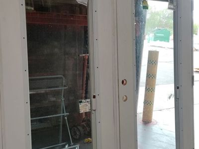 White Exterior French Patio Doors with Full Glass Panels and Built-In Blinds