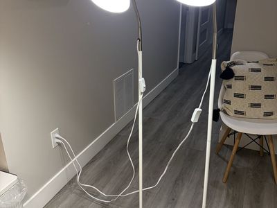 Two standing spot lamps