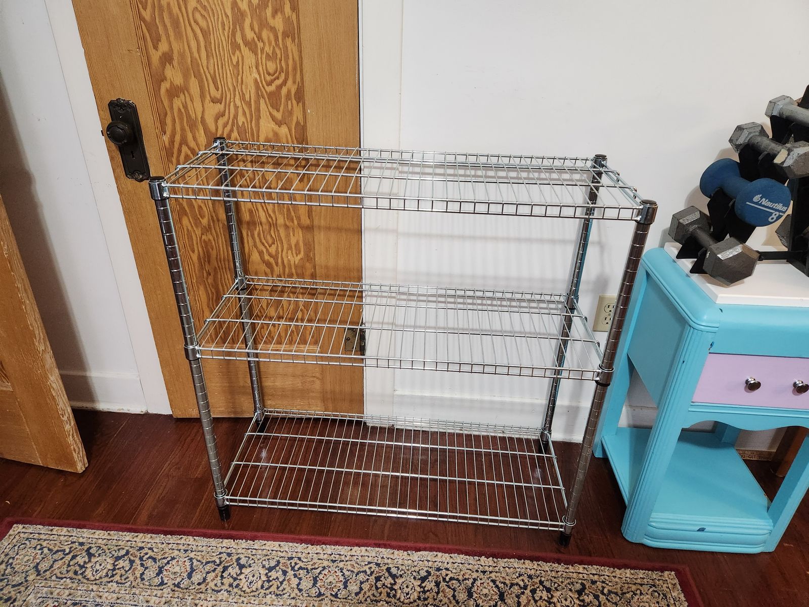3 shelf metal wire shelf system.  Very solid and clean. 3' x 2'