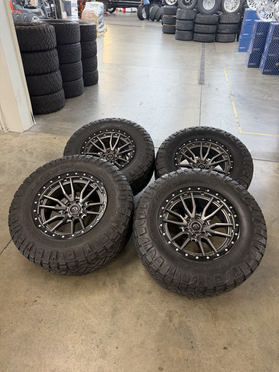 20x10 fuel rebel wheels/ 37x12.50r20 nittos 6x135