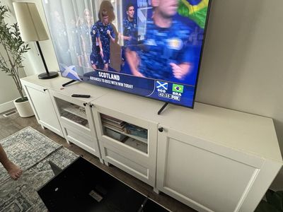 White TV Stand Entertainment Center with Glass Doors and Storage for TVs up to 65 inches