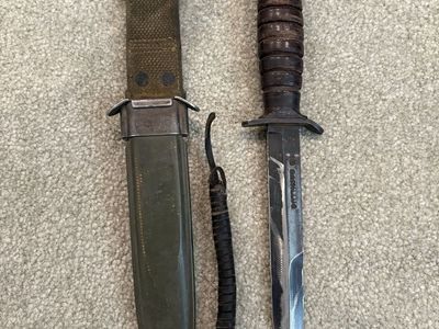 Antique U.S. M3 Fighting Knife with scabbard produced by Camillus during WWIl.