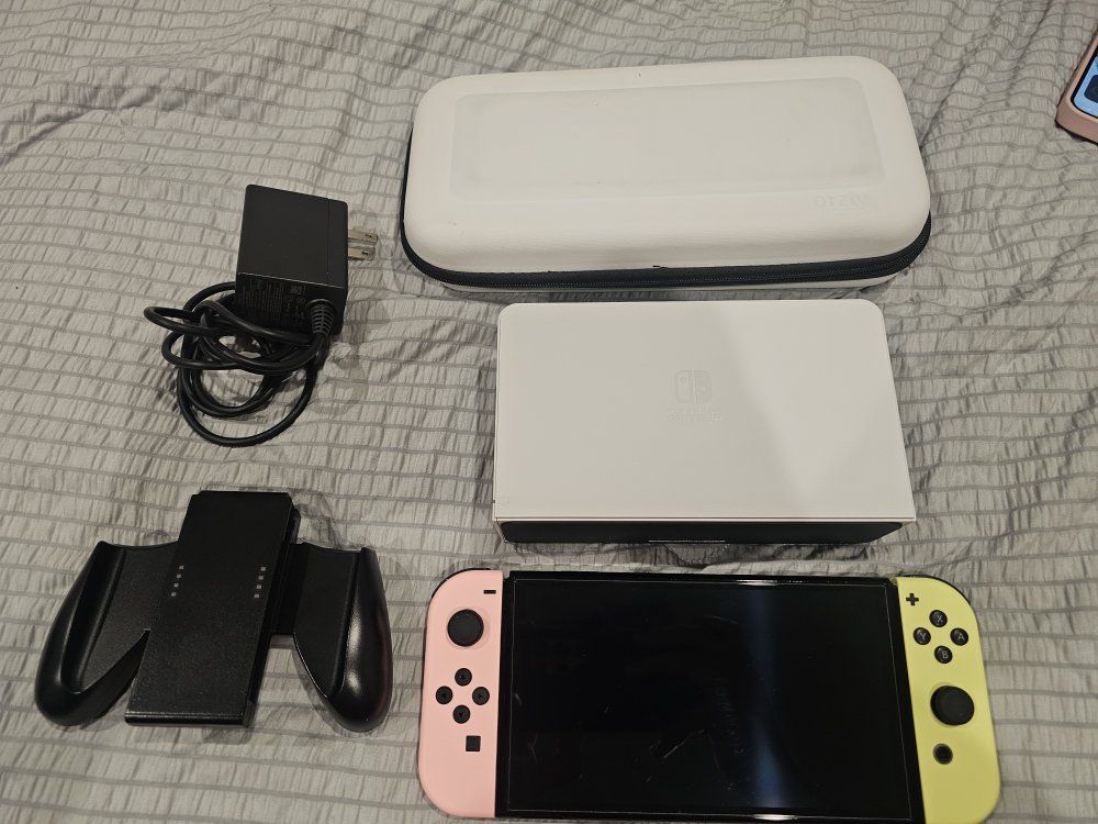 Nintendo switch OLED w/ grips