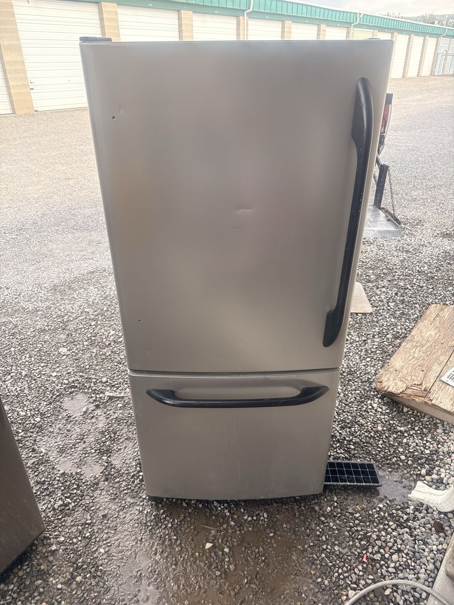 Stainless Steel Bottom Freezer Refrigerator with Black Handles