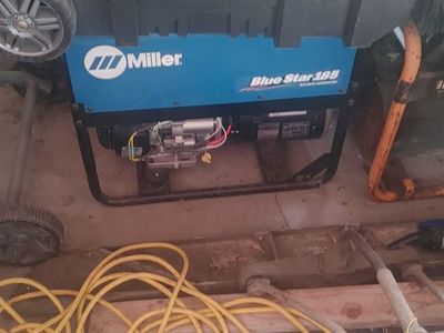 PORTABLE 185 WELDER GENERATOR WITH SUPPLIES, MASK AND CUTTING TORCH GAUGES