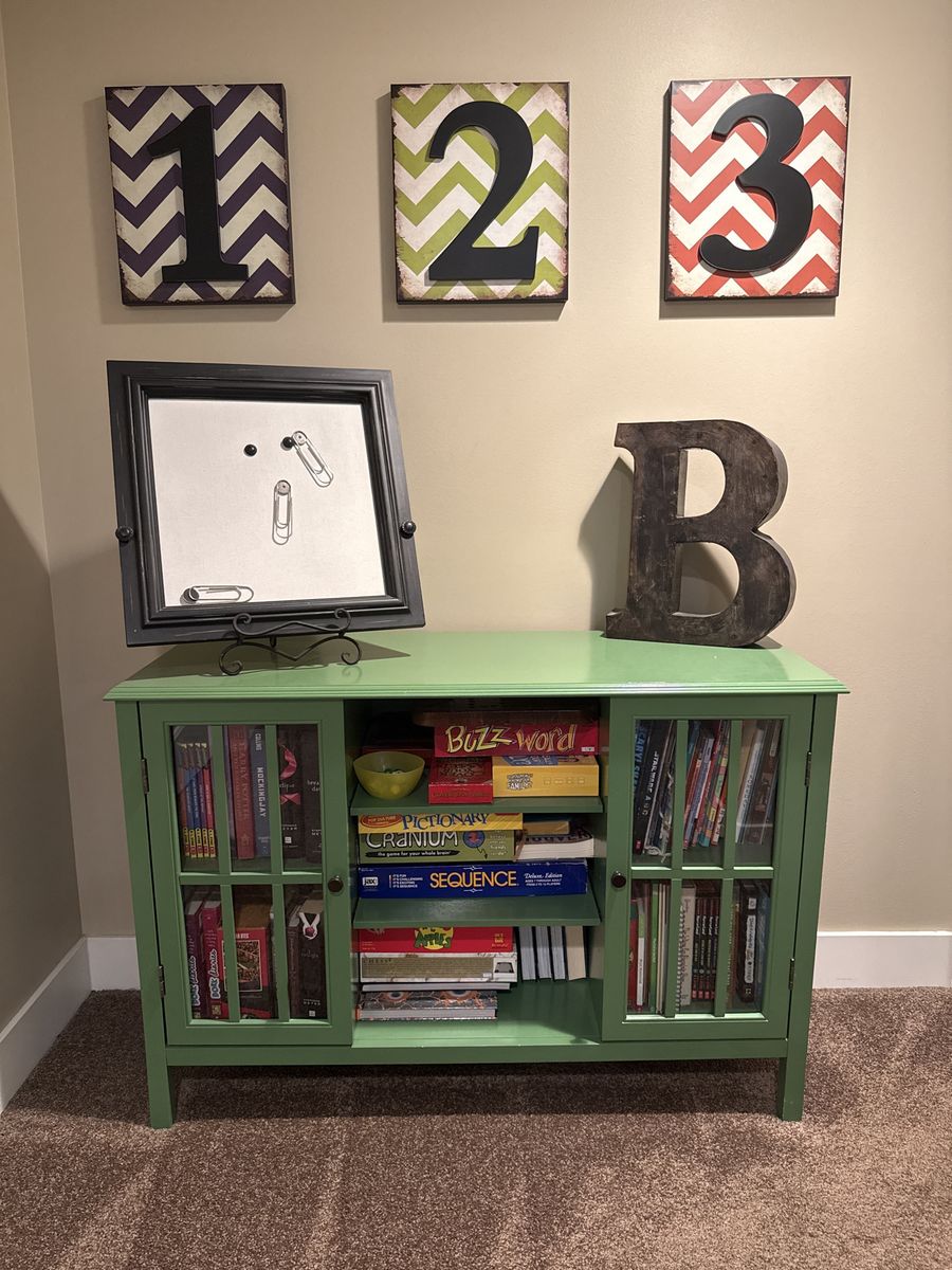 Beautiful green cabinet with glass doors 