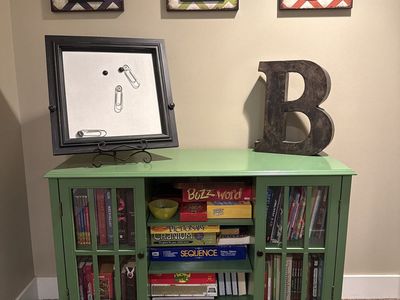 Beautiful green cabinet with glass doors