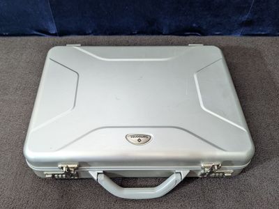 Samsonite aluminum briefcase with combination lock