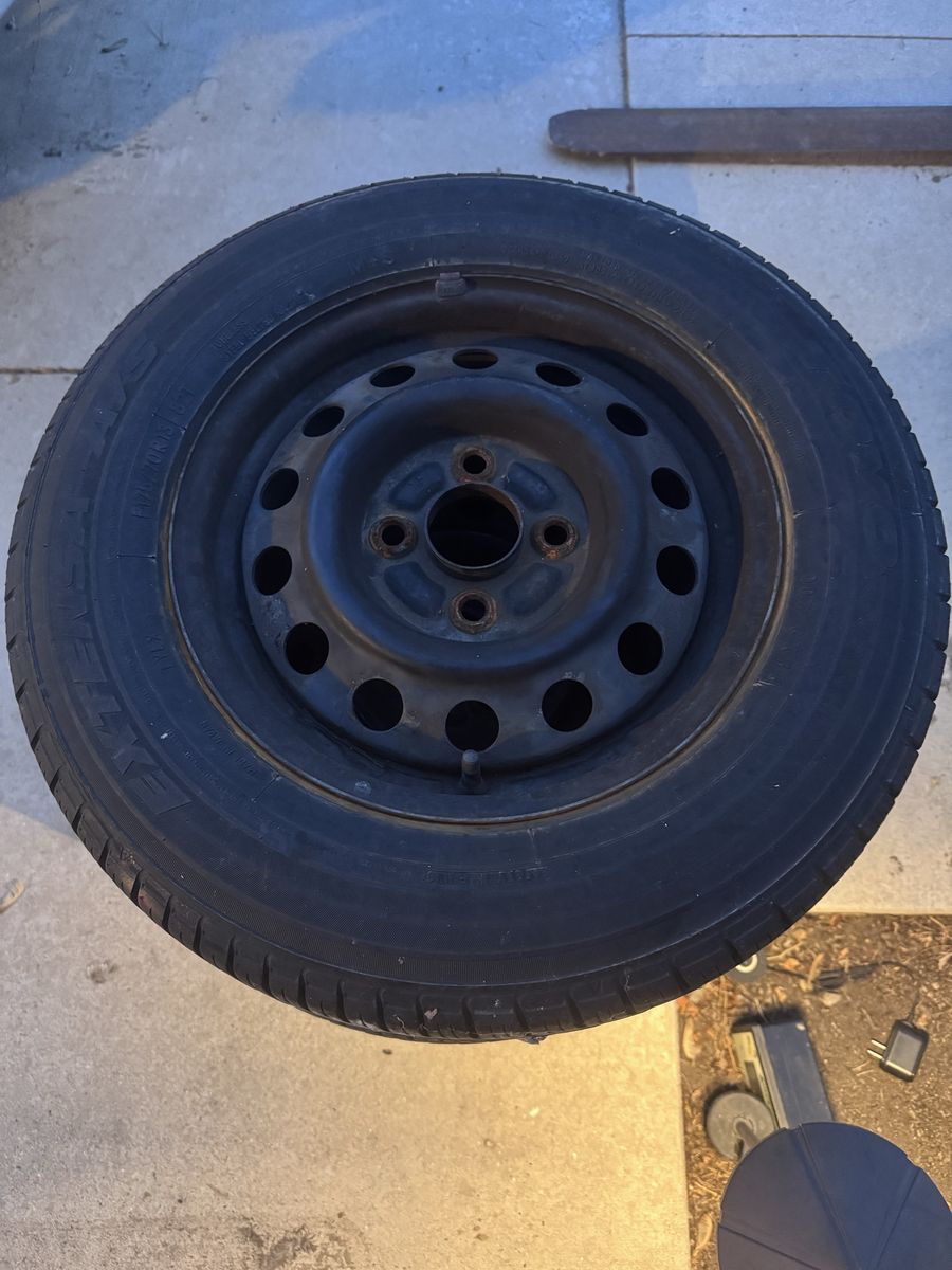 Toyo Extensa A/S 175/70R13 Tire on 4x100 Lug Steel Wheel. 