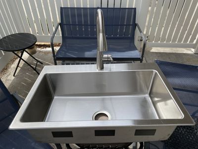 Kohler Stainless Steel Sink and Faucet