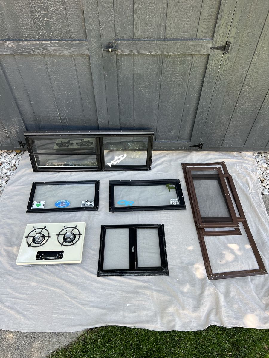 Truck Camper Windows + Parts