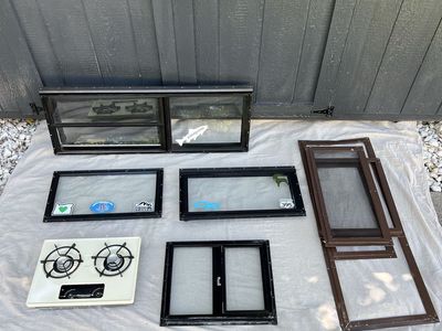 Truck Camper Windows + Parts