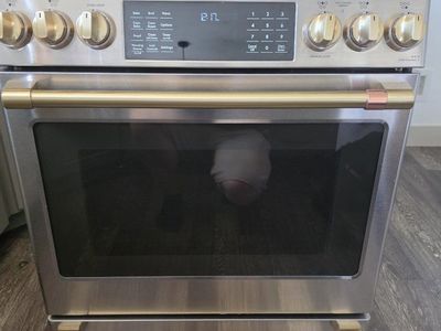 GE Café Smart Slide-In Front-Control Appliance with the model number CES700P2MS5