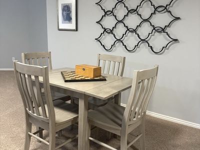 Table and 4 chairs. Solid wood -gray