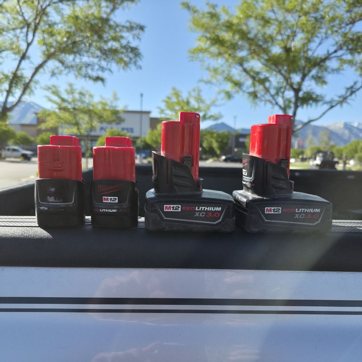4 Milwaukee M12 Batteries (2)CP2.0 (2)XC3.0