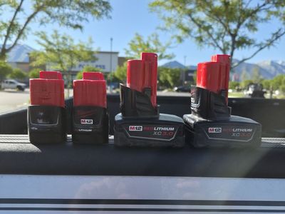 4 Milwaukee M12 Batteries (2)CP2.0 (2)XC3.0