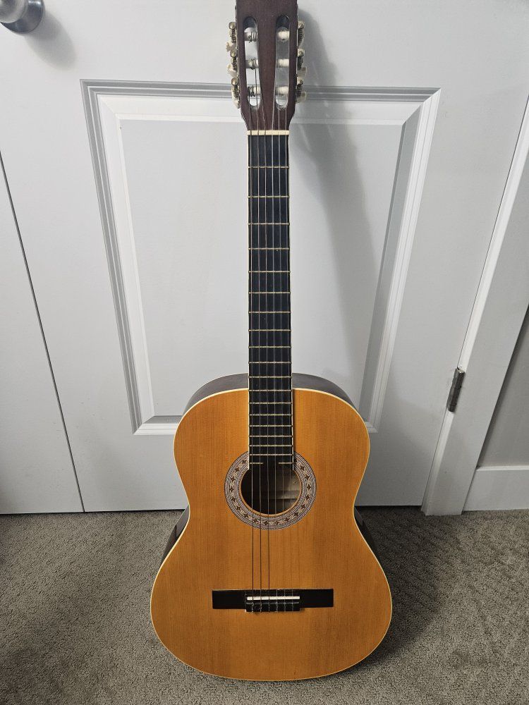 Full sized Classical Guitar