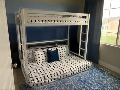Twin white metal bunk bed