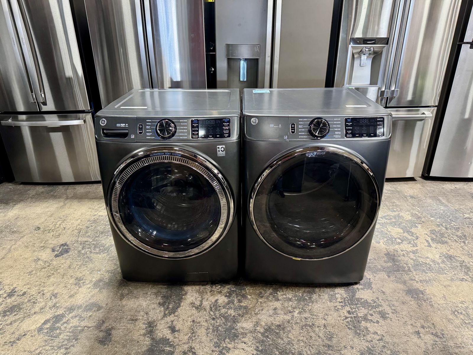 NEW GE FRONT LOAD WASHER AND DRYER SET WITH STEAM