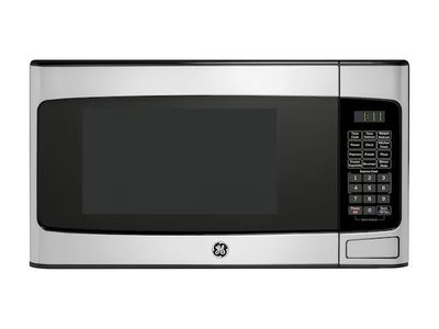 1.1 Cu. Ft. Capacity Countertop Microwave Oven (new in the box)