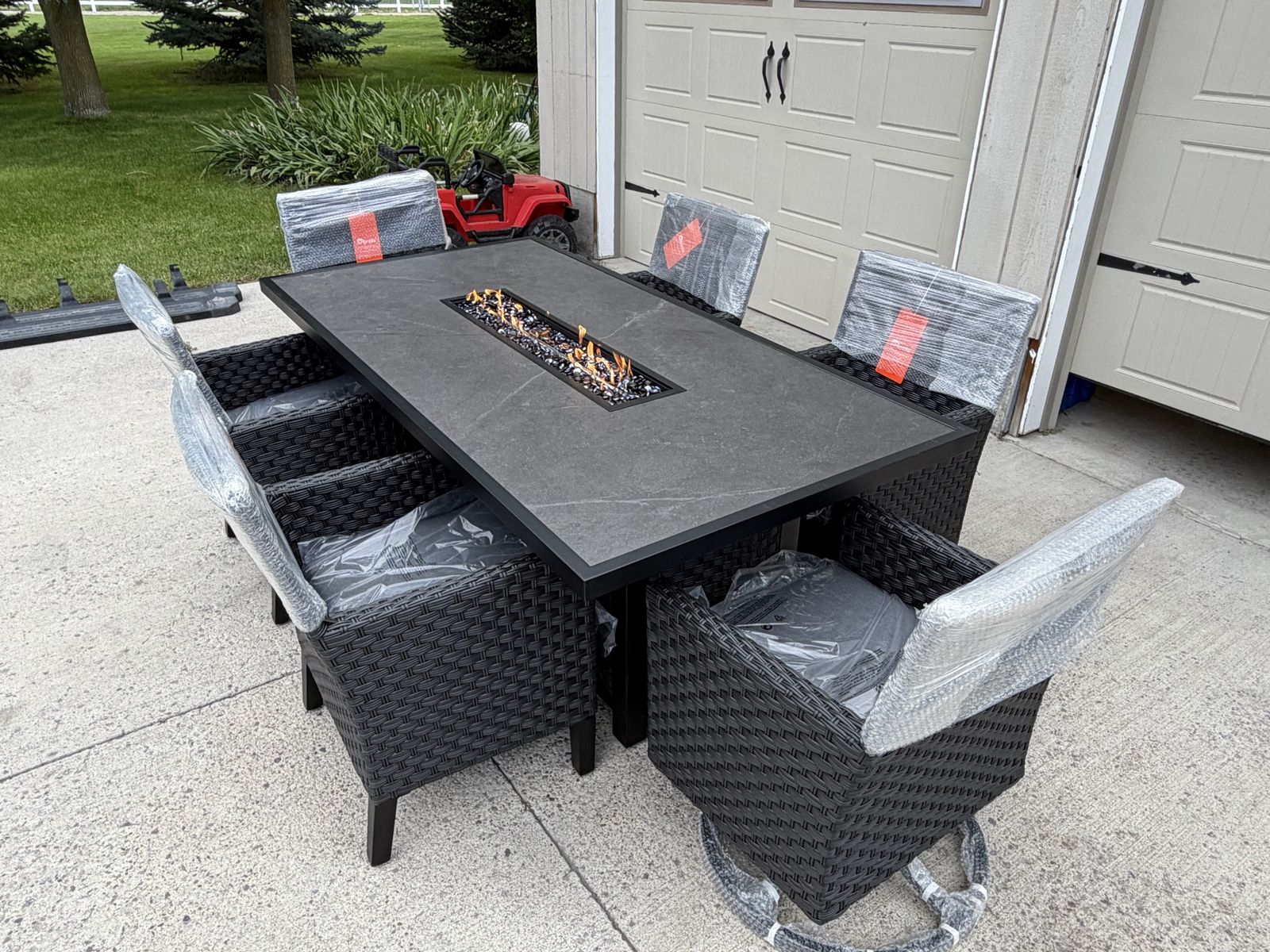 Olympus Fire Pit Dining Set with Sunbrella Fabric, 7pc- Black Wicker w/ Charcoal Cushions