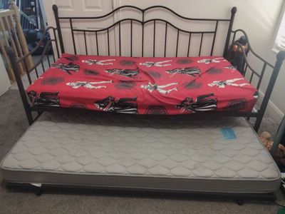 Twin bed frame with pullout