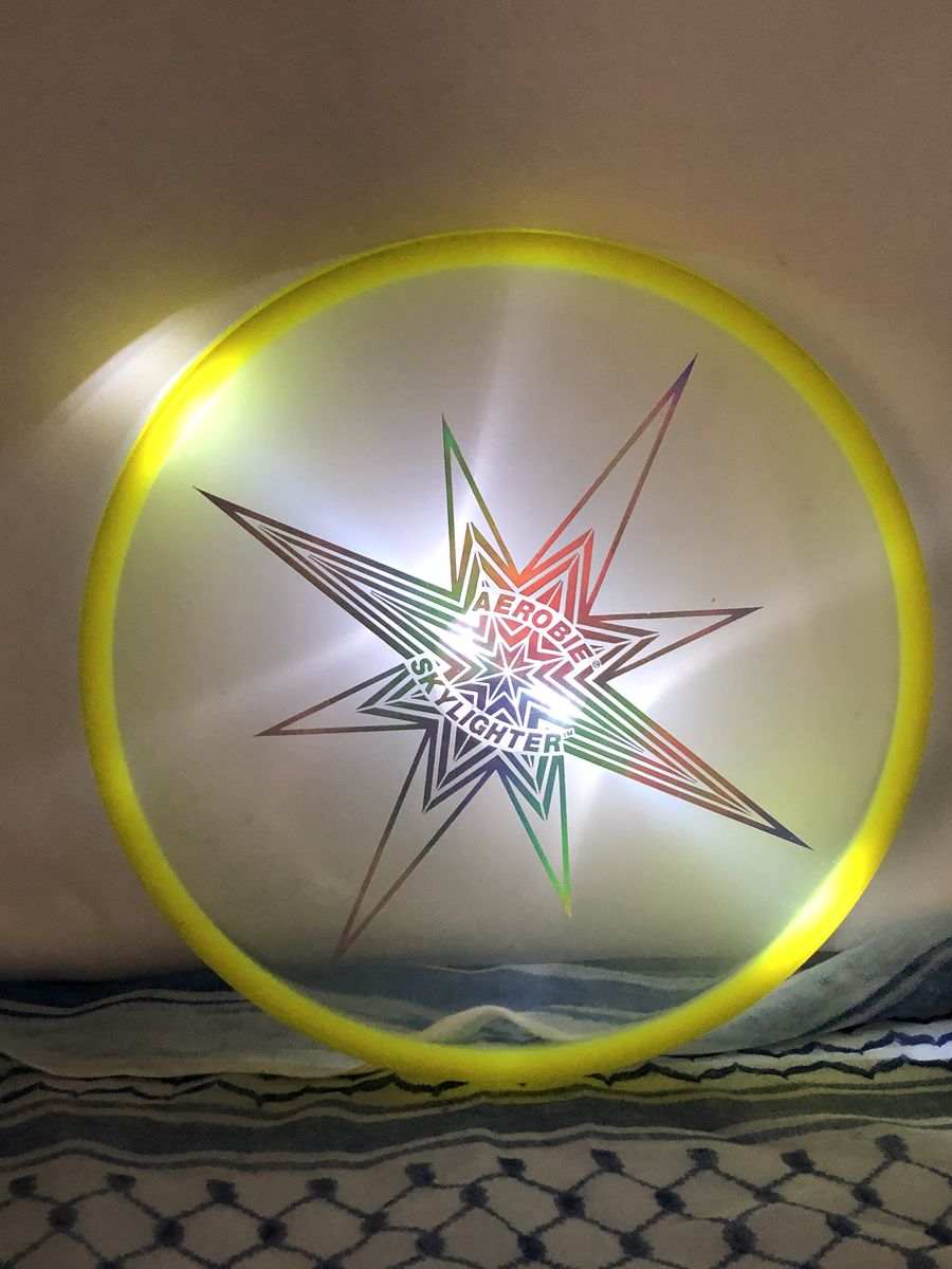 Aerobie Skylighter Glow-in-the-Dark Frisbee – Yellow