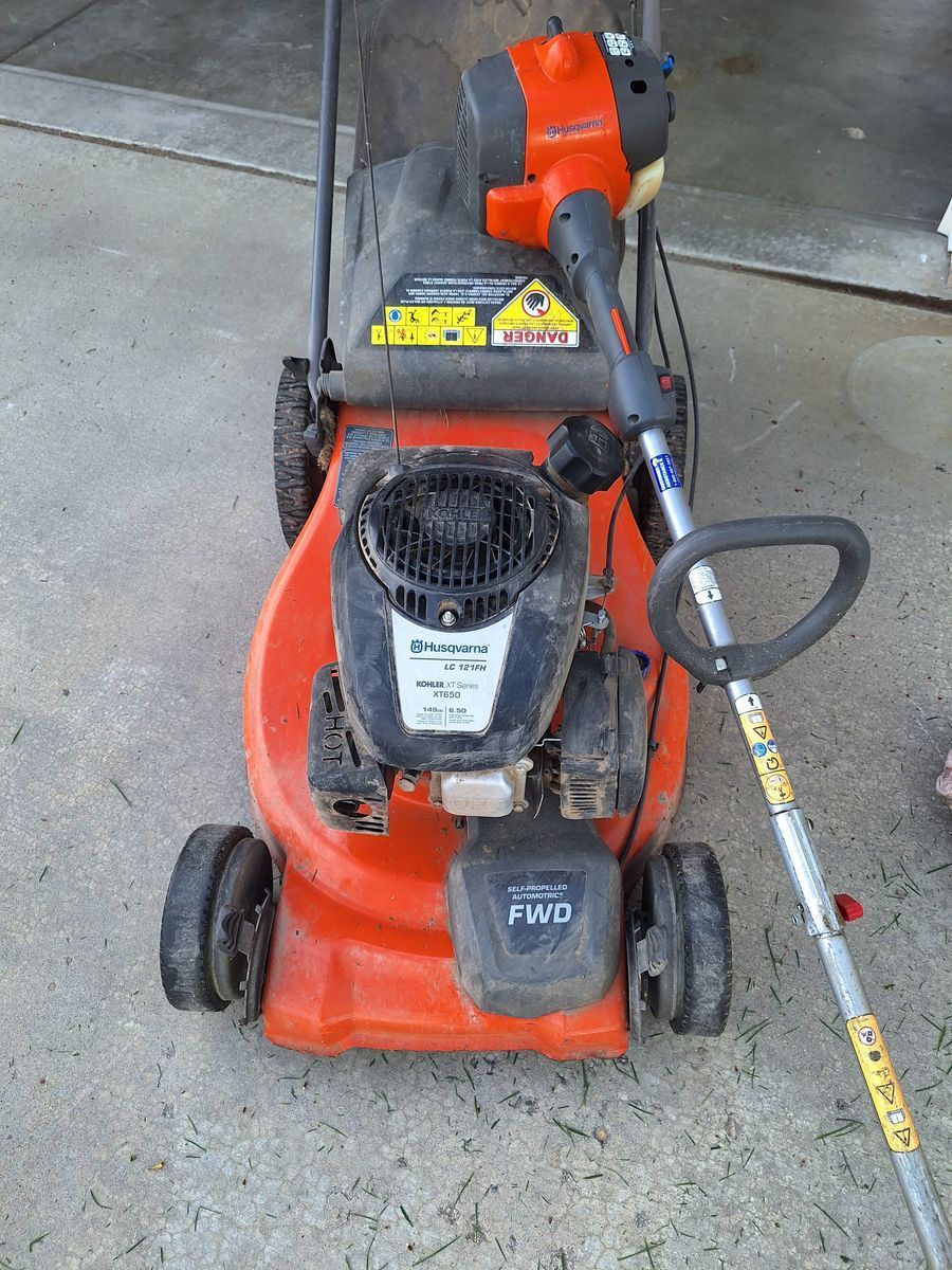 Husquvana lawn mower and gas power weed eater