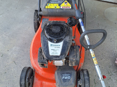Husquvana lawn mower and gas power weed eater