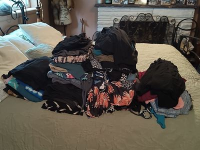 a garbage bag full of clothes