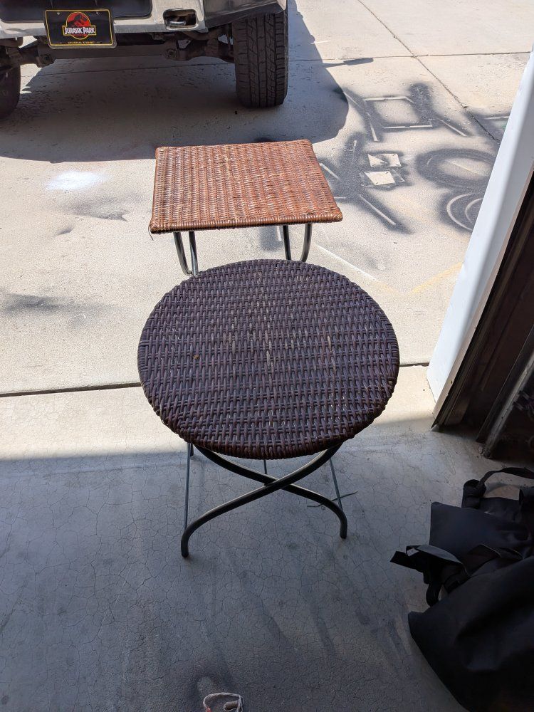 set of wicker and metal tables