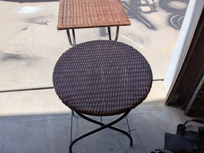 set of wicker and metal tables