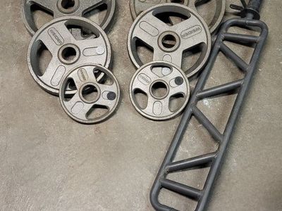 220 pounds of Olympic weights