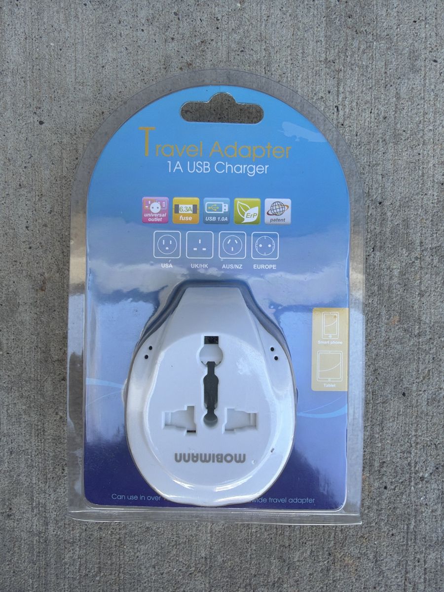 Universal Travel Adapter with 1A USB Charger White New in Package