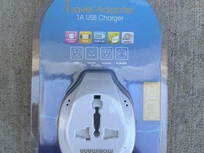 Universal Travel Adapter with 1A USB Charger White New in Package