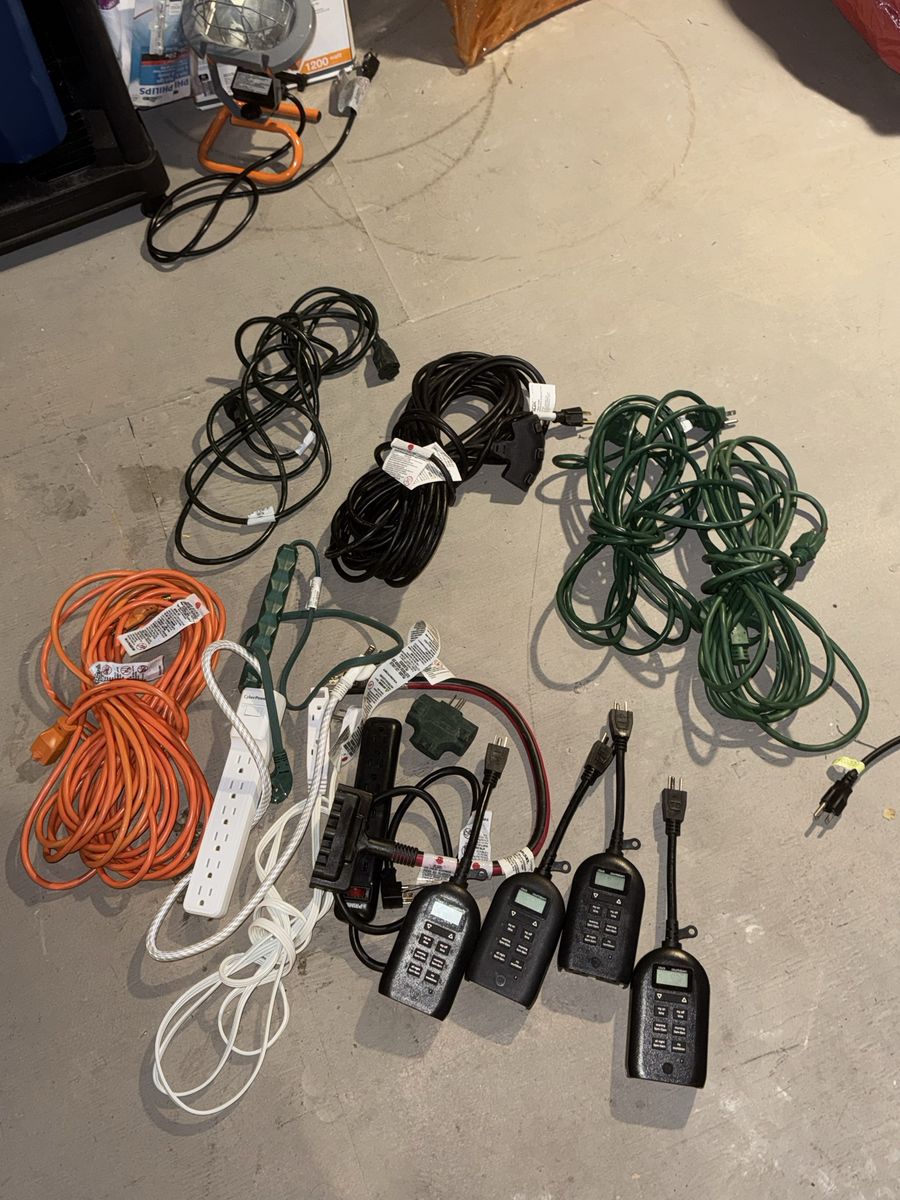 Various electrical extension cords (outdoor and indoor), multi power inputs, exterior cord adapters, timers, etc