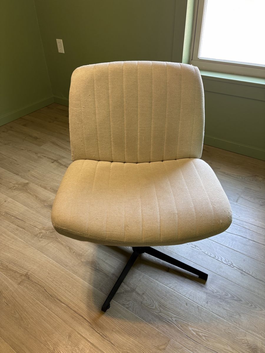 Beige Upholstered Office Desk Chair with Black Metal Swivel Base